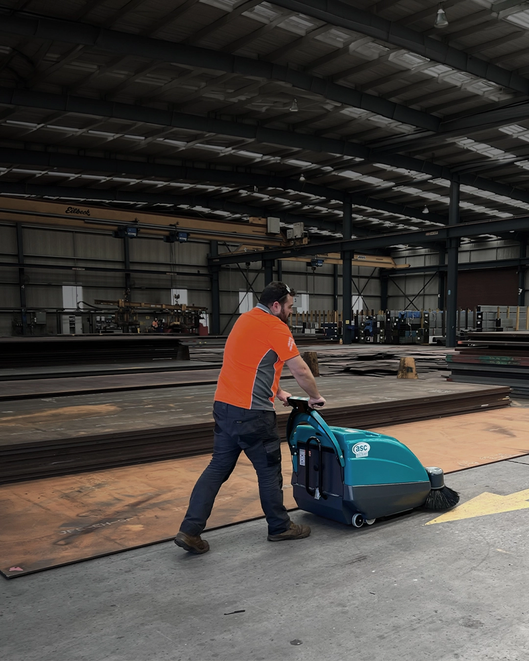 Industrial sweeper cleaning aluminium smelter production facility