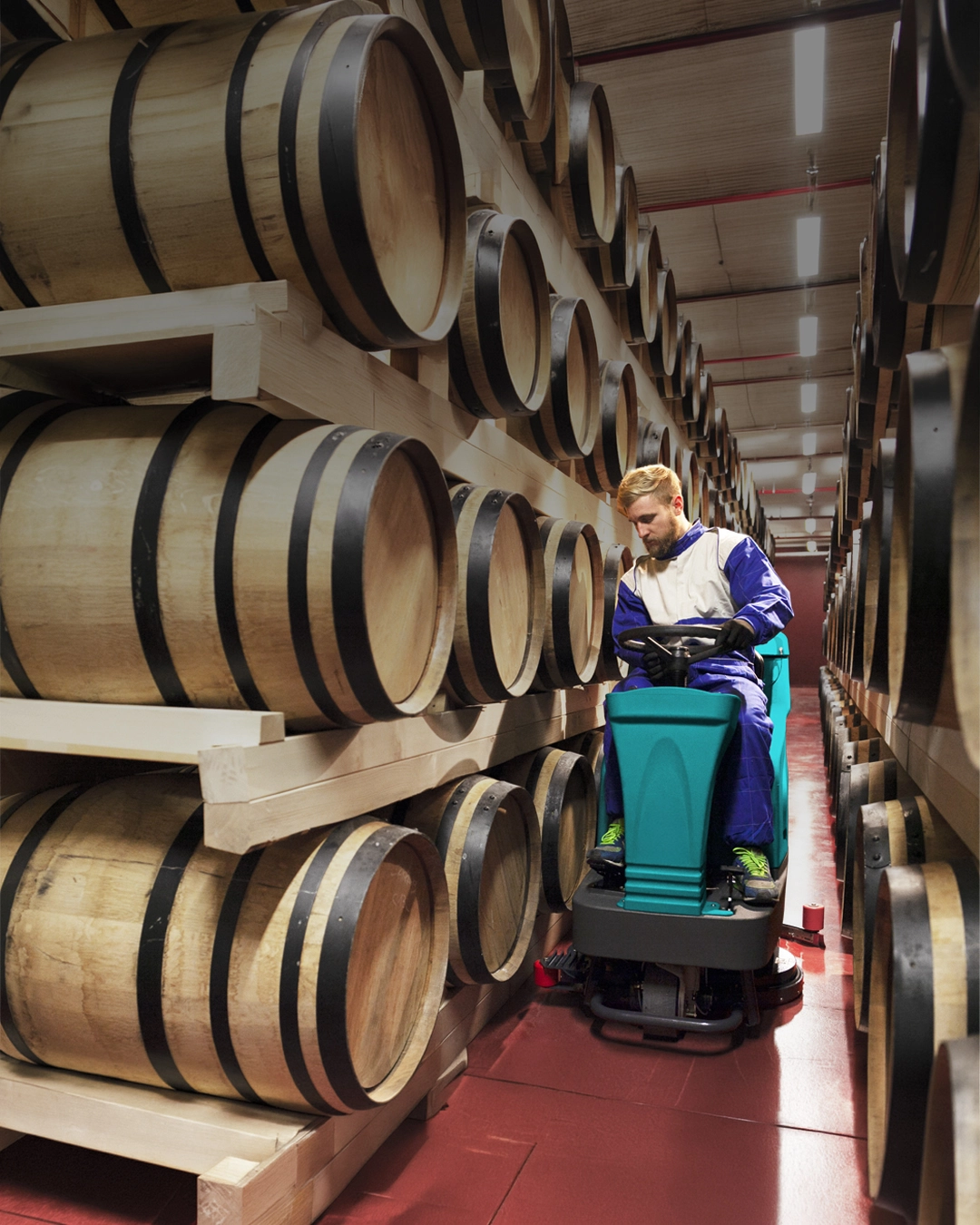 Floor scrubber cleaning hospitality venue and beverage storage area