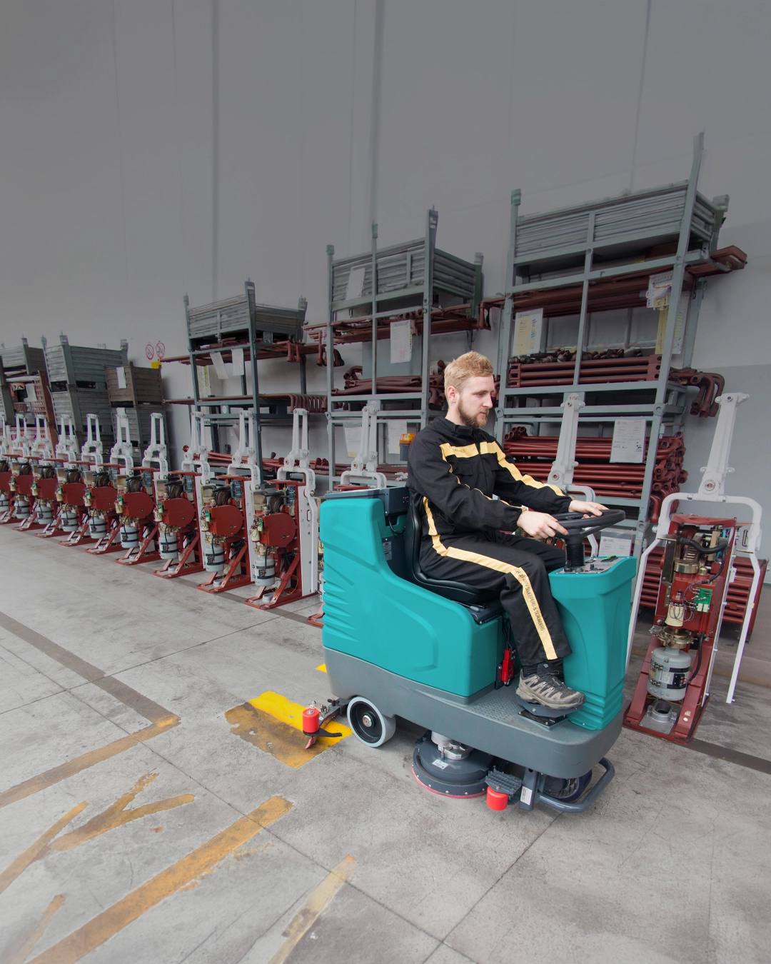 Floor scrubber operating in steel manufacturing facility